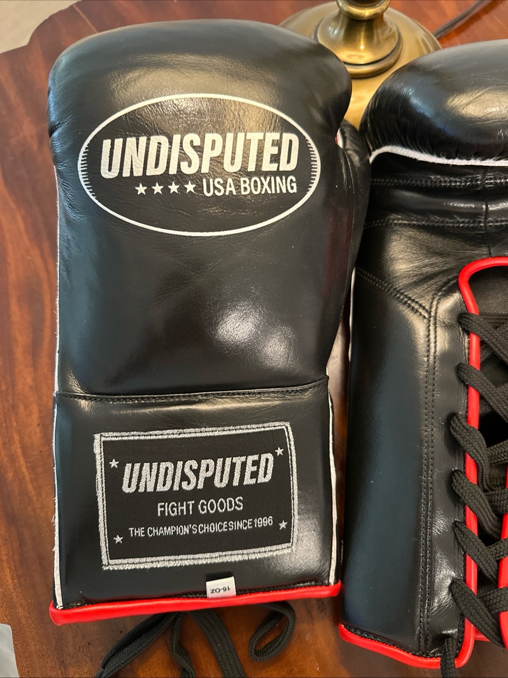 Men's Lace-Up Gloves - Black with Red Trim 16oz. Leather boxing gloves